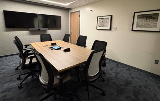 ASH 1205 Zoom Room with conference table and 2 TV monitors